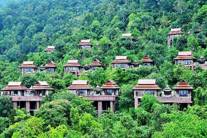 The luxurious villas nestled into the tropical rainforest