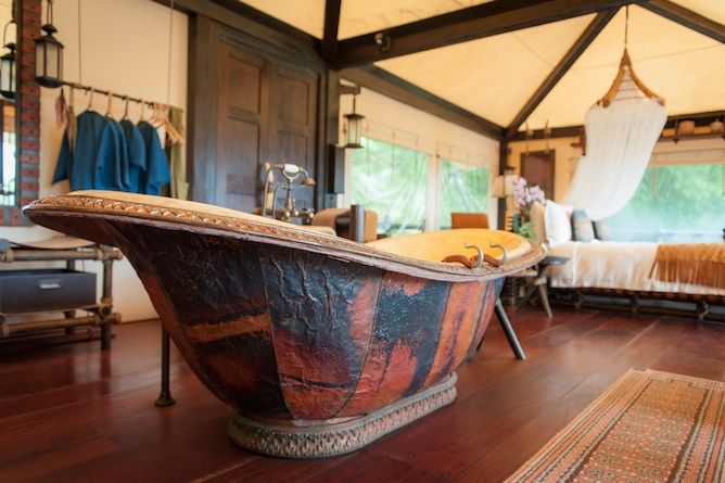 Enjoy the luxury hot-tub with views of the surrounding rainforest