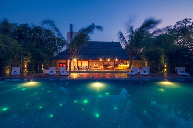 The pool & restaurant at night