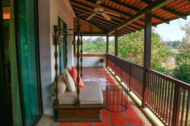 Balcony overlooking the swimming pool & gardens