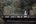 a man and woman walking on a bridge over water