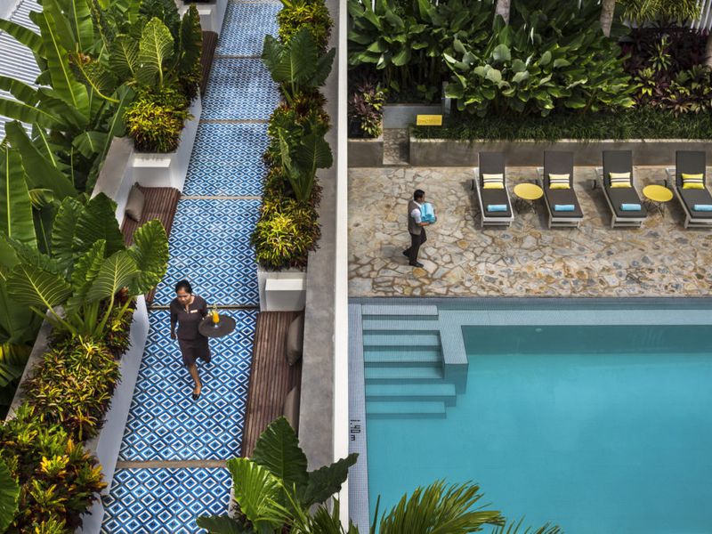 Brightly coloured pool at Viroth's Hotel