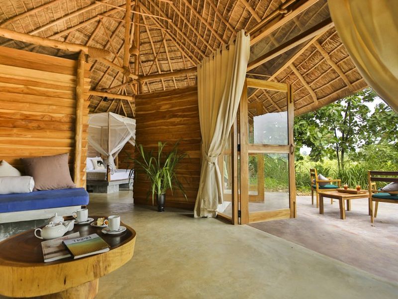 Thatched bungalow at Gal Oya Lodge