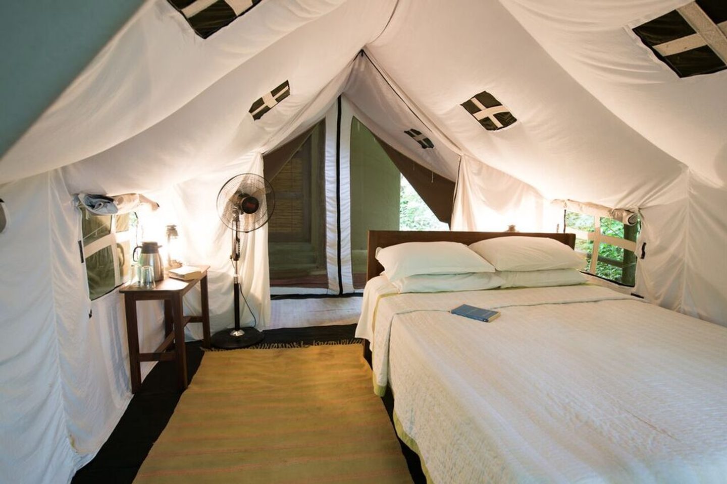Tented bedroom at Tiger Tops Tharu Lodge