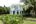 a house with a garden and bushes