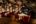 a restaurant with tables and chairs in a cave