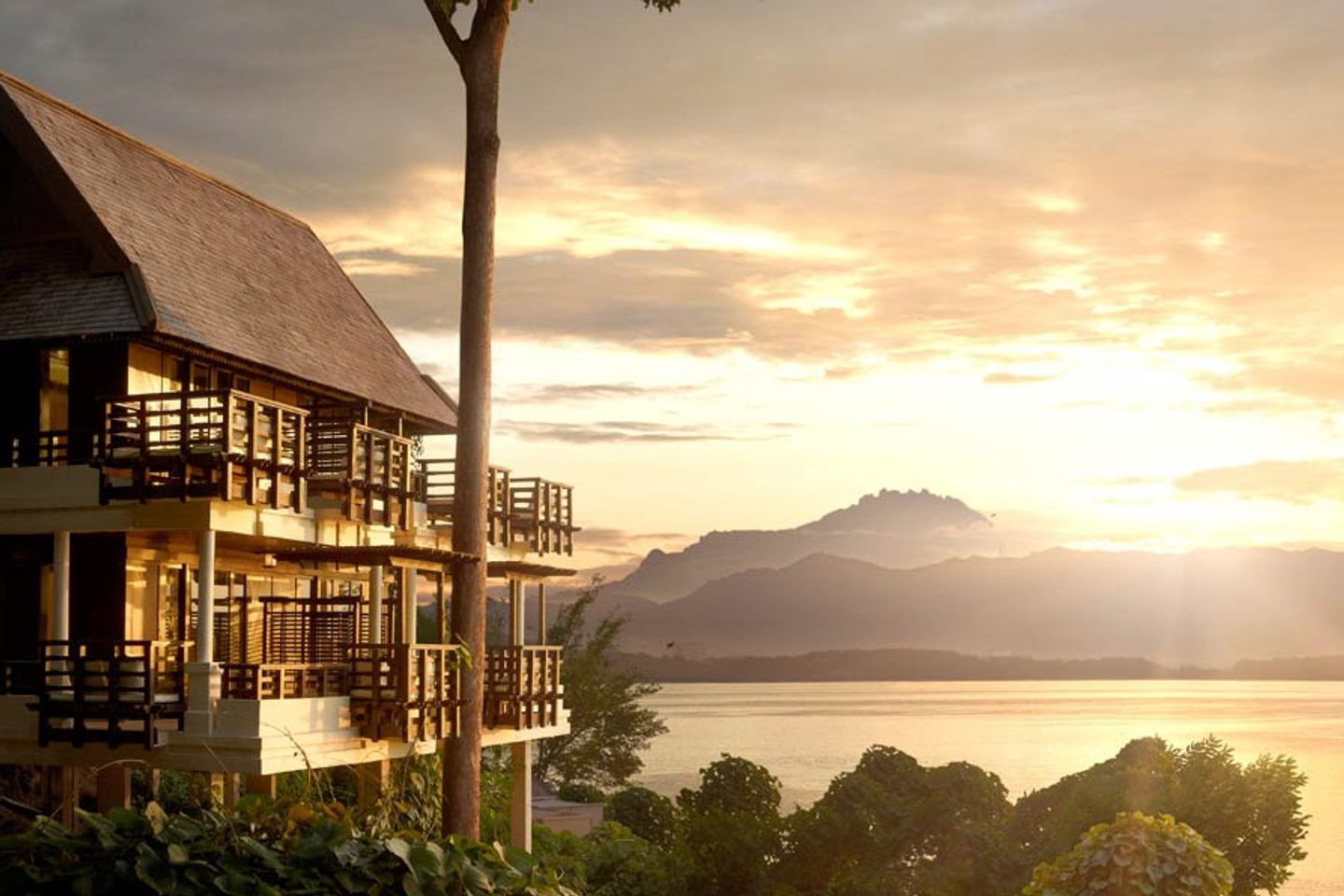 Sunset over the mountains at Gaya Island Resort