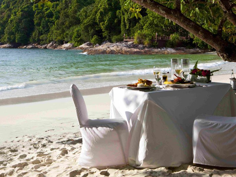 Dining on the beach at Pangkor Laut Resort