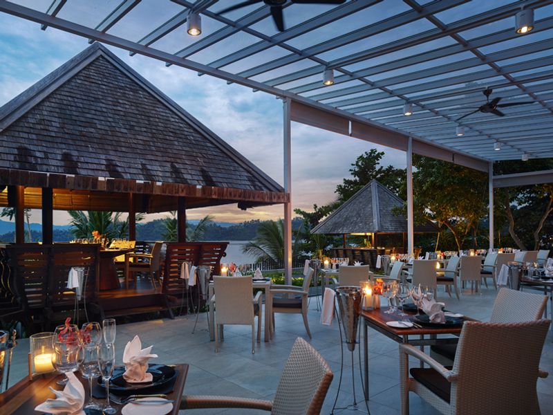 Restaurant at sunset at Gaya Island Resort
