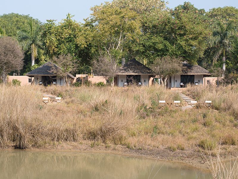 Thatched cottages at Khem Villas