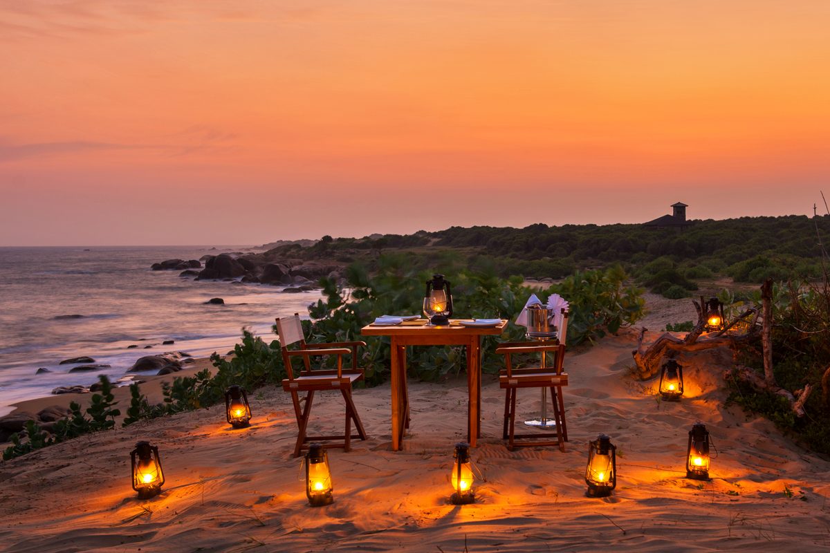 Candlelit dinner on the beach Chena Huts Sri Lanka