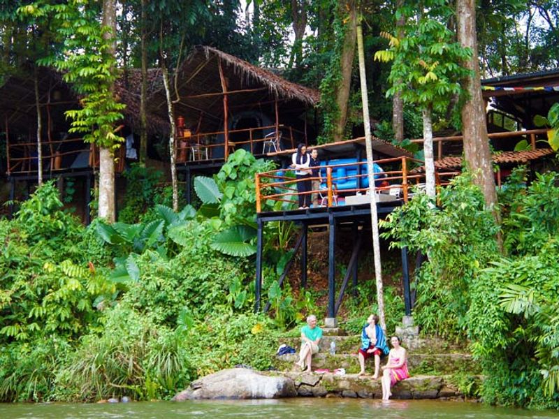 Borderlands Camp next to river