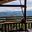 a view of mountains from a porch