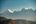 a mountain range with snow on top