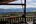 a view of mountains from a porch