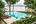 Swimming pool overlooking river at The River Resort