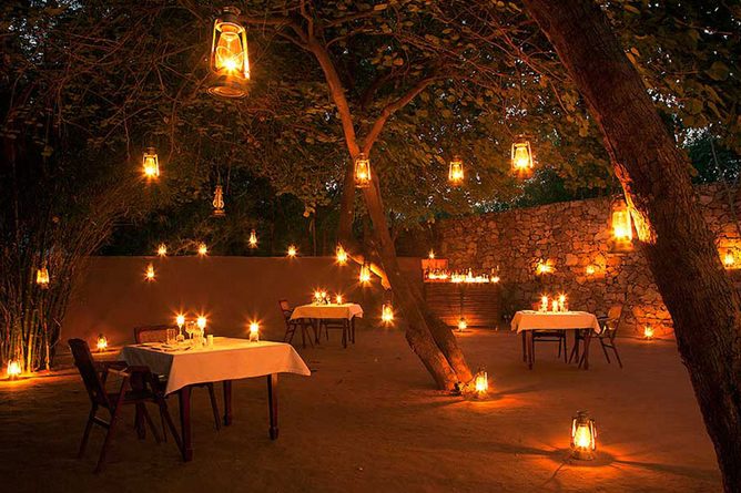 Dining by lamplight