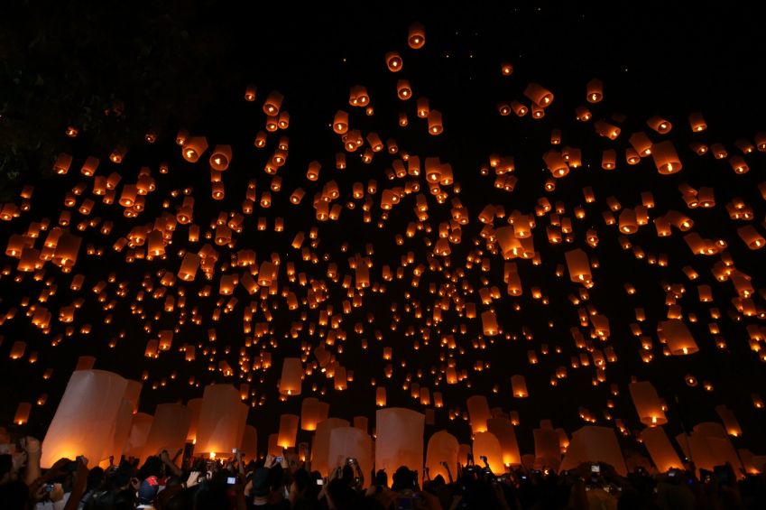 Lanterns being released into the night sky