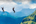 Two people ziplining