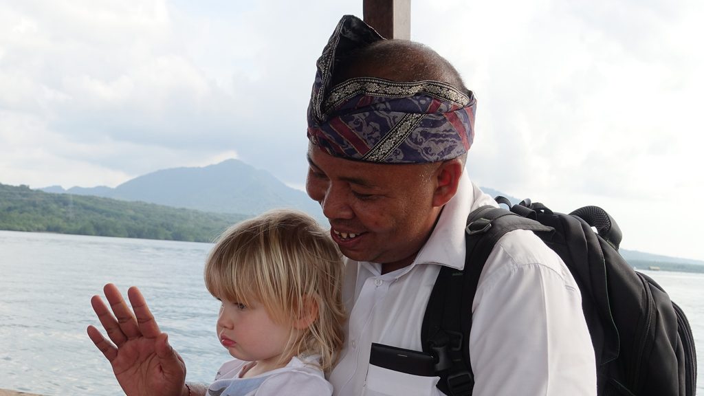 Man on a boat with baby
