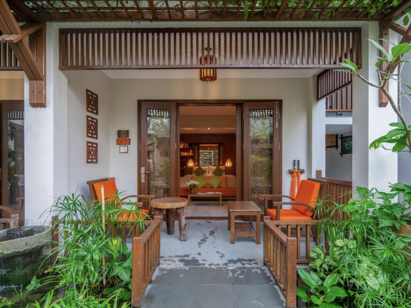 Bedroom with veranda at at Hoi An Chic