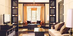 a living room with a couch and a table