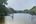 a group of people on paddle boards in a river