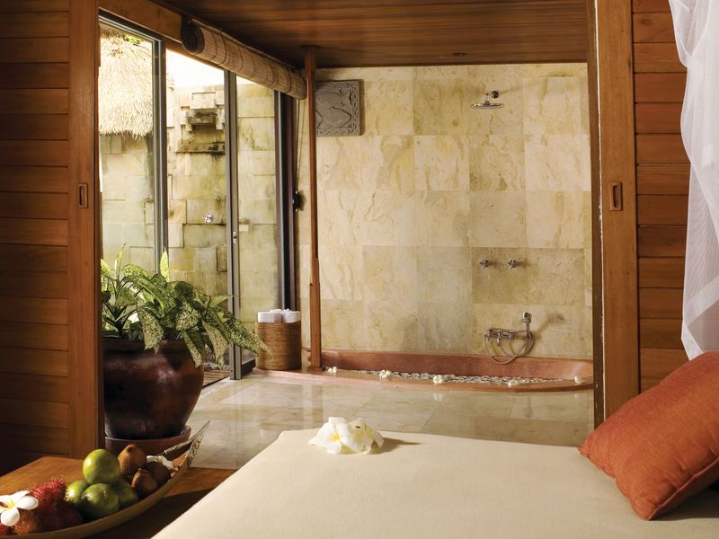 Bedroom with sunken bath at Belmond Jimbaran Puri Indonesia