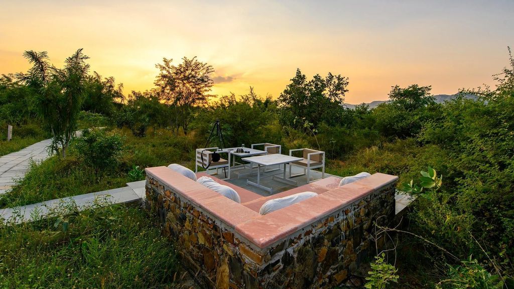 Outdoor seating area at sunset