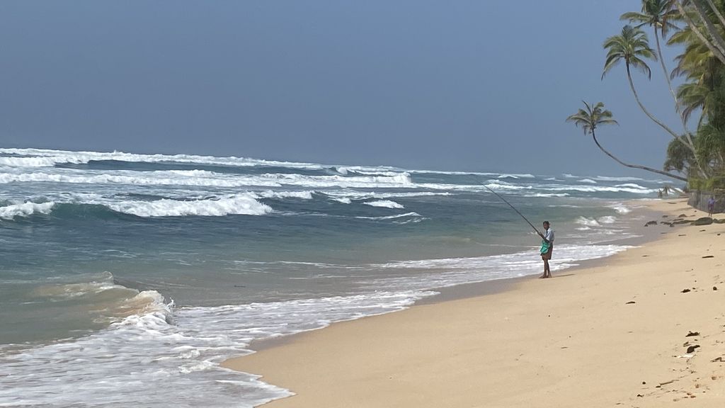 Waves crashing on beach Sri Lanka