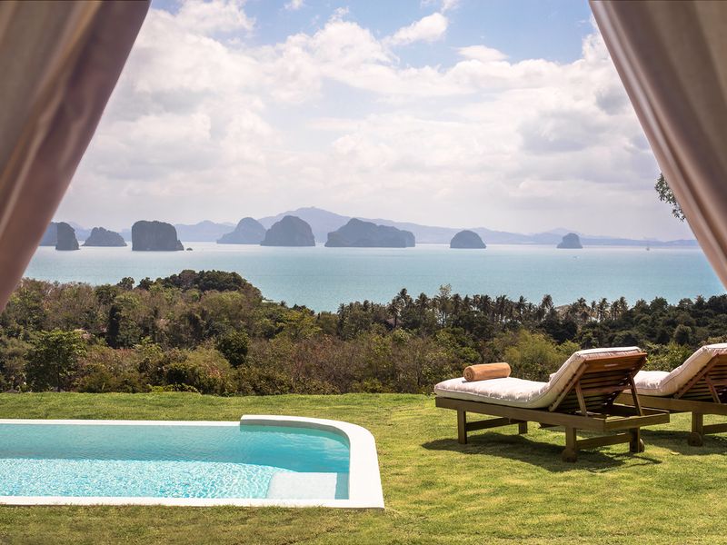 Pool overlooking limestone karsts and sea at 9 Hornbills
