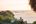 Woman watching sunset over the sea Nusa Tenggara Indonesia