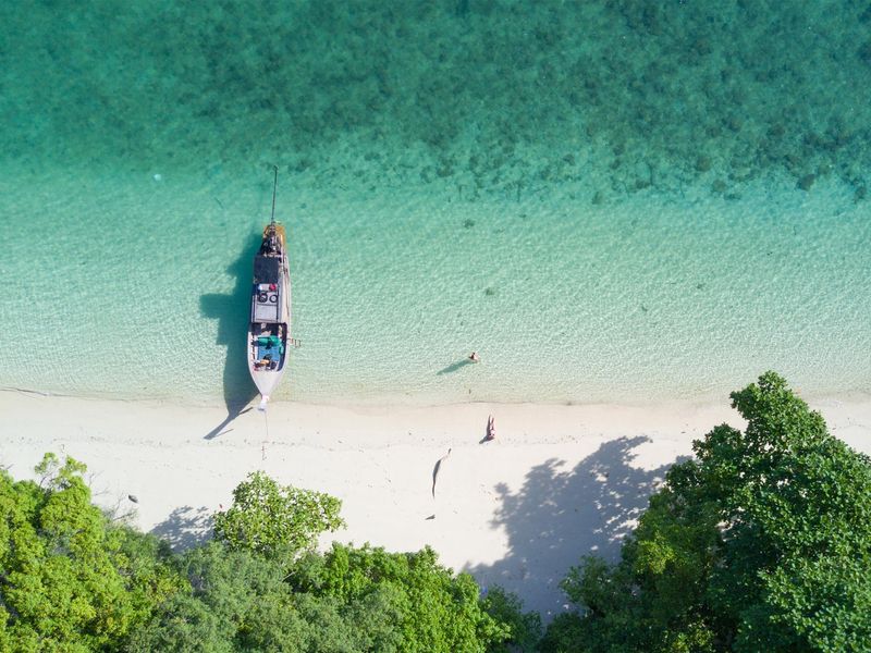 Boat in the sea from above