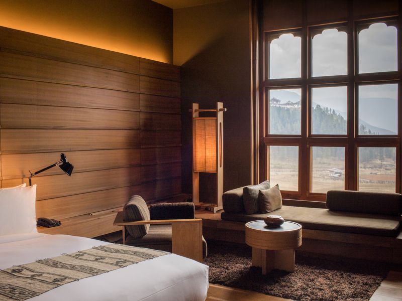 Bedroom at Gangtey Lodge with view across valley