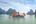 a boat on the water with Ha Long Bay in the background