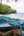 a group of boats on a beach