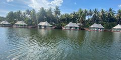 a group of houses on water