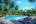 a pool with lounge chairs and trees