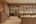 a room with a counter and shelves
