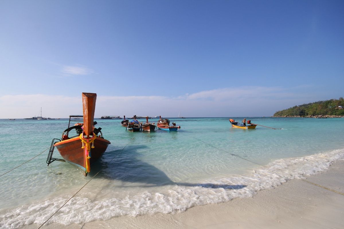 Boats by the shoreline Koh Lipe Thailand