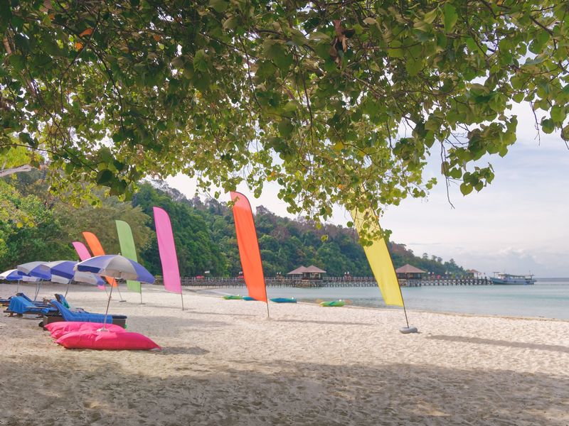 Flags on the beach at Bungaraya Resort