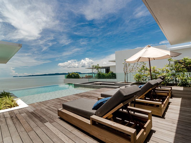 Loungers on the terrace at Cove 55