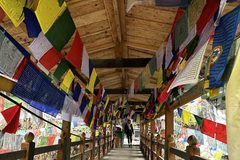 a bridge with colorful flags