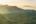 a landscape of mountains and fog