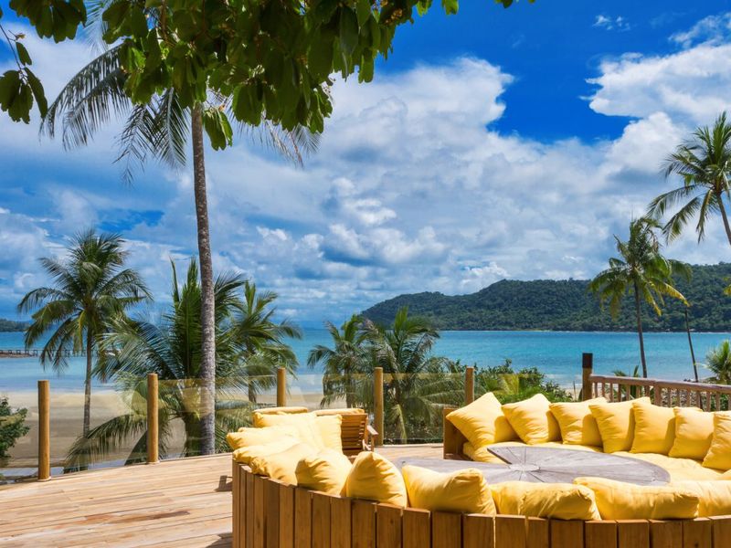 Seating area on the terrace with sea view at Soneva Kiri