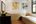 Bathroom with art at Satri House