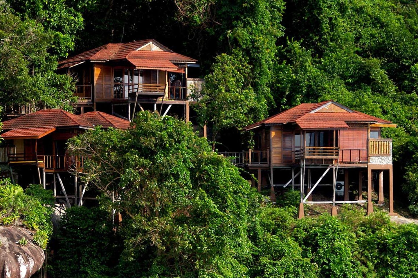 Stilted bungalows in jungle at Japamala Resort