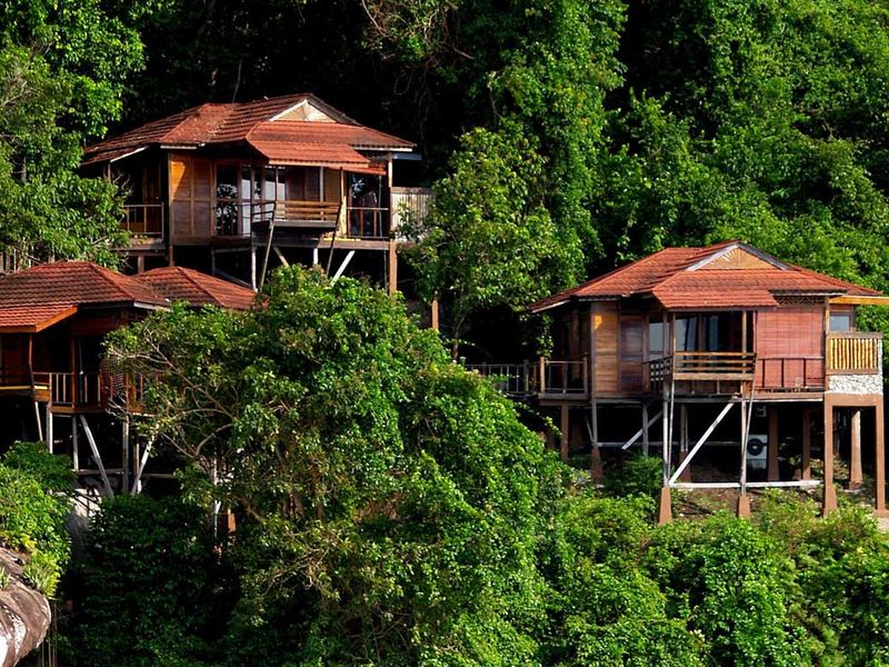 Stilted bungalows in jungle at Japamala Resort