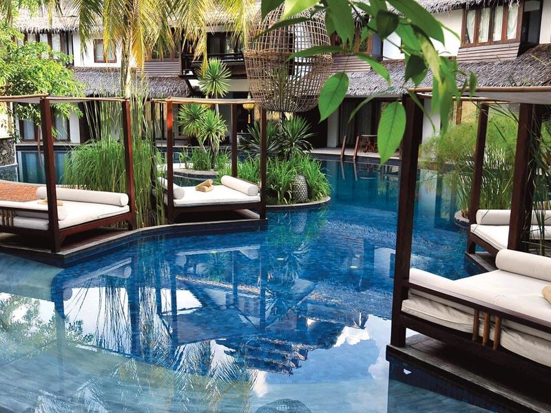 Pool with day beds at Villa Samadhi