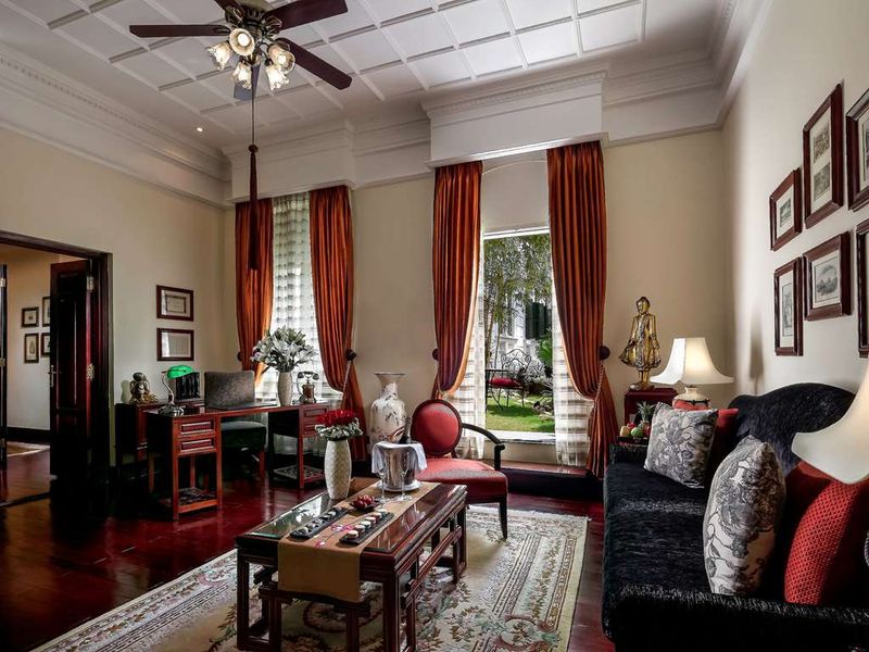 Lounge in a suite at Sofitel Legend Metropole Hanoi